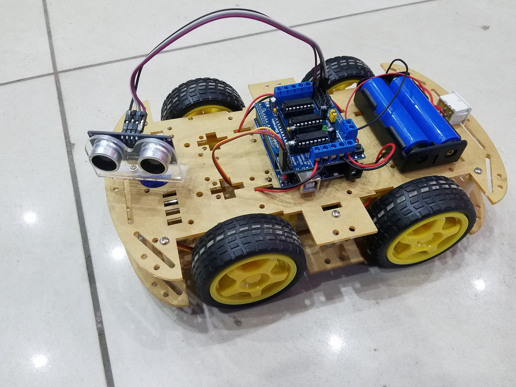 Obstacle Avoiding Robot using Arduino uno and L293d with HC sr04 Sensor